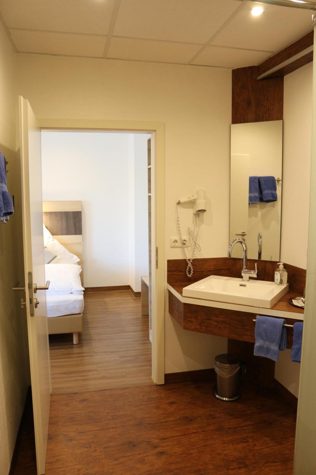 Hotel Baldus Делменхорст Стая снимка